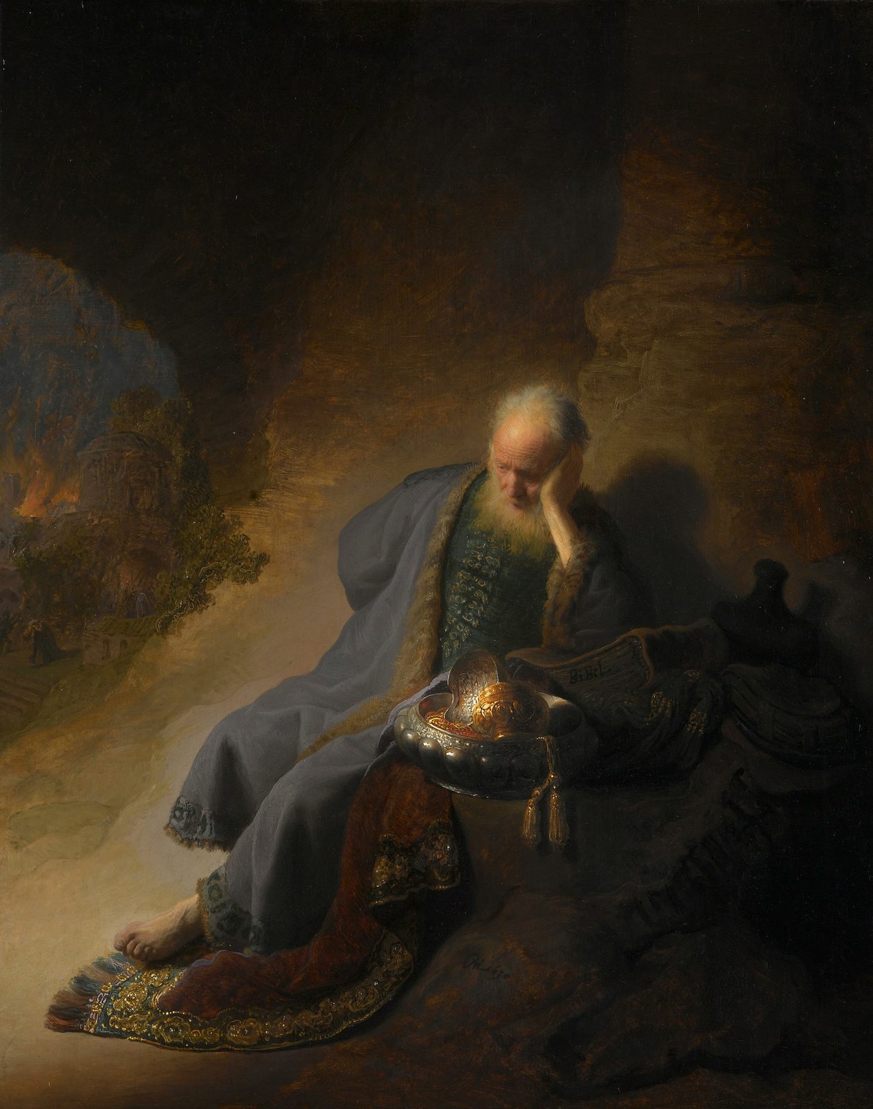 Person sitting alone with their phone glowing in a darkened room, representing the real cost of phone overuse